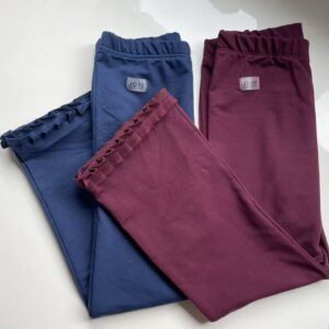 Platėjančios mergaitiškos kelnės